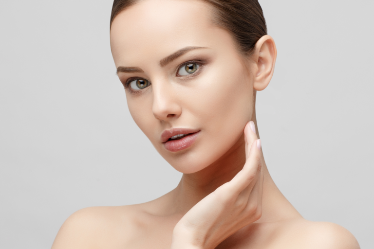 Jaw Surgery woman touching jawline